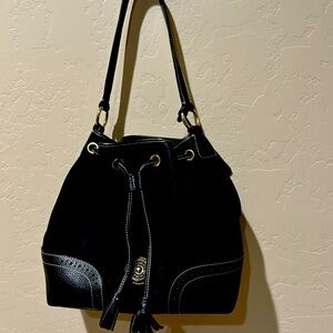 Dooney & Burke, black nubuck and leather, drawstring, bucket bag.